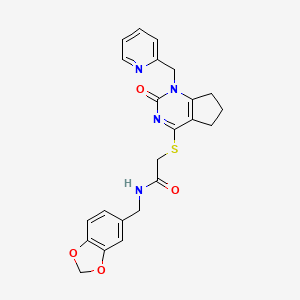 molecular formula C23H22N4O4S B2455470 N-(benzo[d][1,3]dioxol-5-ylméthyl)-2-((2-oxo-1-(pyridin-2-ylméthyl)-2,5,6,7-tétrahydro-1H-cyclopenta[d]pyrimidin-4-yl)thio)acétamide CAS No. 899955-25-0