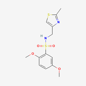 molecular formula C13H16N2O4S2 B2457373 2,5-dimethoxy-N-[(2-methyl-1,3-thiazol-4-yl)methyl]benzenesulfonamide CAS No. 863510-89-8