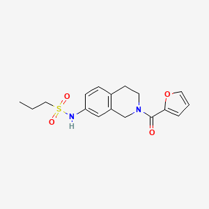 molecular formula C17H20N2O4S B2457539 N-(2-(furan-2-carbonyl)-1,2,3,4-tetrahydroisoquinolin-7-yl)propane-1-sulfonamide CAS No. 955697-49-1