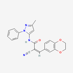 molecular formula C22H18N4O3 B2457586 (Z)-2-Cyano-3-(2,3-dihydro-1,4-benzodioxin-6-yl)-N-(5-methyl-2-phenylpyrazol-3-yl)prop-2-enamide CAS No. 882231-70-1