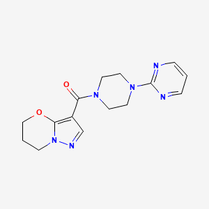 molecular formula C15H18N6O2 B2459078 (6,7-dihydro-5H-pyrazolo[5,1-b][1,3]oxazin-3-yl)(4-(pyrimidin-2-yl)piperazin-1-yl)methanone CAS No. 1421517-62-5
