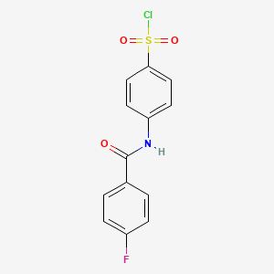 molecular formula C13H9ClFNO3S B2459600 4-(4-Fluorobenzamido)benzene-1-sulfonyl chloride CAS No. 1016713-31-7
