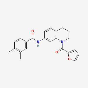 molecular formula C23H22N2O3 B2459826 N-[1-(2-furoyl)-1,2,3,4-tetrahydroquinolin-7-yl]-3,4-dimethylbenzamide CAS No. 946319-81-9