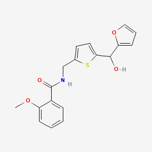 molecular formula C18H17NO4S B2461421 N-((5-(furan-2-yl(hydroxy)methyl)thiophen-2-yl)methyl)-2-methoxybenzamide CAS No. 1798459-05-8