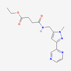 molecular formula C15H19N5O3 B2462593 ethyl 4-(((1-methyl-3-(pyrazin-2-yl)-1H-pyrazol-5-yl)methyl)amino)-4-oxobutanoate CAS No. 2034550-61-1