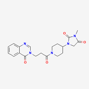 molecular formula C20H23N5O4 B2462998 3-methyl-1-(1-(3-(4-oxoquinazolin-3(4H)-yl)propanoyl)piperidin-4-yl)imidazolidine-2,4-dione CAS No. 2176202-22-3