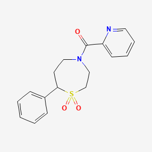 molecular formula C17H18N2O3S B2463390 （1,1-二氧化-7-苯基-1,4-噻氮杂环-4-基）（吡啶-2-基）甲酮 CAS No. 2320924-45-4