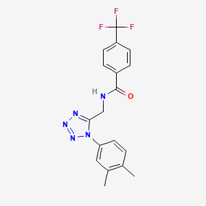 molecular formula C18H16F3N5O B2463678 N-[[1-(3,4-二甲基苯基)四唑-5-基]甲基]-4-(三氟甲基)苯甲酰胺 CAS No. 897622-41-2