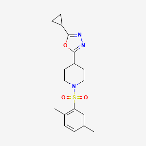 molecular formula C18H23N3O3S B2464629 2-Cyclopropyl-5-(1-((2,5-dimethylphenyl)sulfonyl)piperidin-4-yl)-1,3,4-oxadiazole CAS No. 1172486-08-6