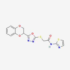 molecular formula C15H12N4O4S2 B2465945 2-[[5-(2,3-二氢-1,4-苯并二氧杂环-3-基)-1,3,4-恶二唑-2-基]硫代]-N-(1,3-噻唑-2-基)乙酰胺 CAS No. 851130-04-6