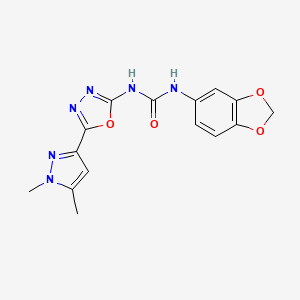 molecular formula C15H14N6O4 B2466396 1-(苯并[d][1,3]二氧杂环-5-基)-3-(5-(1,5-二甲基-1H-吡唑-3-基)-1,3,4-恶二唑-2-基)脲 CAS No. 1257549-81-7