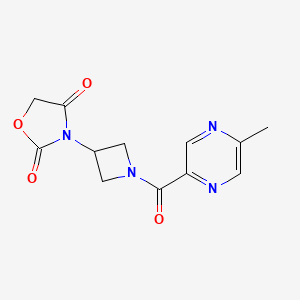 molecular formula C12H12N4O4 B2466878 3-(1-(5-Methylpyrazine-2-carbonyl)azetidin-3-yl)oxazolidine-2,4-dione CAS No. 2034309-70-9