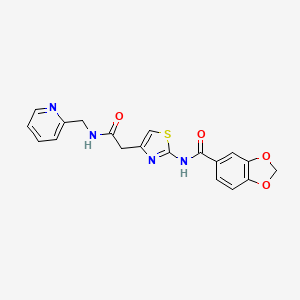 molecular formula C19H16N4O4S B2467611 N-(4-(2-oxo-2-((pyridin-2-ylmethyl)amino)ethyl)thiazol-2-yl)benzo[d][1,3]dioxole-5-carboxamide CAS No. 941985-06-4