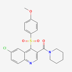molecular formula C22H21ClN2O4S B2467802 6-Chloro-4-[(4-methoxyphenyl)sulfonyl]-3-(piperidin-1-ylcarbonyl)quinoline CAS No. 1111015-09-8