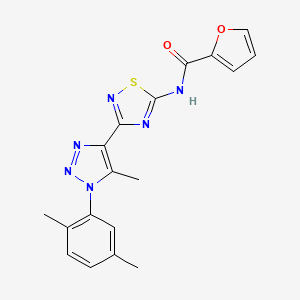 N-{3-[1-(2,5-dimethylphenyl)-5-methyl-1H-1,2,3-triazol-4-yl]-1,2,4-thiadiazol-5-yl}furan-2-carboxamide