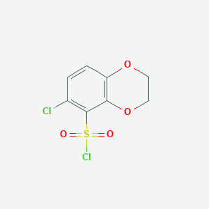 molecular formula C8H6Cl2O4S B2469260 6-Chloro-2,3-dihydro-1,4-benzodioxine-5-sulfonyl chloride CAS No. 1785272-64-1