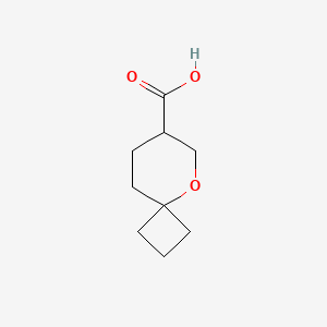 molecular formula C9H14O3 B2471433 5-氧代螺[3.5]壬烷-7-羧酸 CAS No. 2248296-76-4
