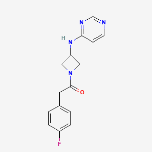 2-(4-Fluorophenyl)-1-{3-[(pyrimidin-4-yl)amino]azetidin-1-yl}ethan-1-one