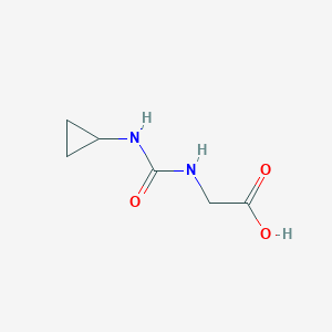 molecular formula C6H10N2O3 B2472570 2-[(Cyclopropylcarbamoyl)amino]acetic acid CAS No. 953906-56-4