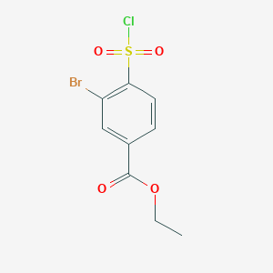 molecular formula C9H8BrClO4S B2473130 Ethyl 3-bromo-4-(chlorosulfonyl)benzoate CAS No. 1000932-93-3