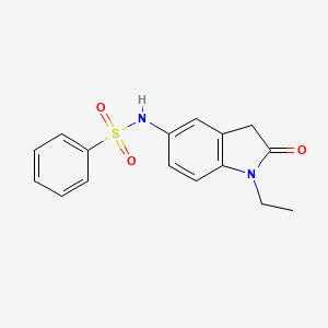 molecular formula C16H16N2O3S B2473474 N-(1-ethyl-2-oxoindolin-5-yl)benzenesulfonamide CAS No. 921535-82-2