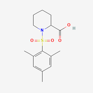 molecular formula C15H21NO4S B2473680 1-(Mesitylsulfonyl)piperidine-2-carboxylic acid CAS No. 380222-32-2