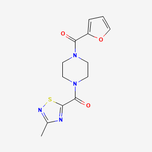 molecular formula C13H14N4O3S B2473777 (4-(Furan-2-carbonyl)piperazin-1-yl)(3-methyl-1,2,4-thiadiazol-5-yl)methanone CAS No. 1448121-99-0
