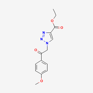 molecular formula C14H15N3O4 B2473975 ethyl 1-[2-(4-methoxyphenyl)-2-oxoethyl]-1H-1,2,3-triazole-4-carboxylate CAS No. 1375415-14-7