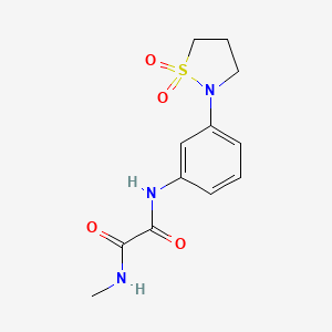 molecular formula C12H15N3O4S B2474301 N'-[3-(1,1-ジオキソ-1,2-チアゾリジン-2-イル)フェニル]-N-メチルオキサミド CAS No. 1087796-43-7