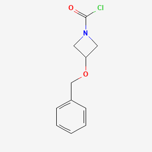 molecular formula C11H12ClNO2 B2474517 3-苯甲氧基氮杂环丁烷-1-酰氯 CAS No. 2287298-09-1