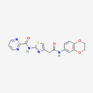 molecular formula C18H15N5O4S B2474939 N-(4-(2-((2,3-dihidrobenzo[b][1,4]dioxin-6-il)amino)-2-oxoethyl)tiazol-2-il)pirimidina-2-carboxamida CAS No. 1286709-76-9