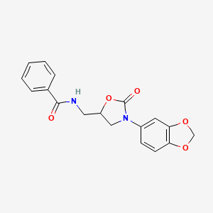 molecular formula C18H16N2O5 B2475349 N-((3-(benzo[d][1,3]dioxol-5-yl)-2-oxooxazolidin-5-yl)methyl)benzamide CAS No. 954675-79-7