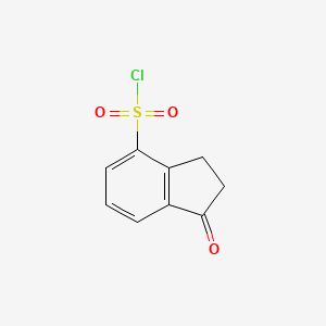 molecular formula C9H7ClO3S B2475526 1-氧代-2,3-二氢-1H-茚烯-4-磺酰氯 CAS No. 1935247-73-6