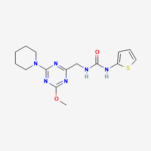 molecular formula C15H20N6O2S B2477164 1-((4-Methoxy-6-(piperidin-1-yl)-1,3,5-triazin-2-yl)methyl)-3-(thiophen-2-yl)urea CAS No. 2034578-38-4