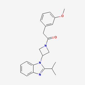 2-(3-Methoxyphenyl)-1-[3-(2-propan-2-ylbenzimidazol-1-yl)azetidin-1-yl]ethanone