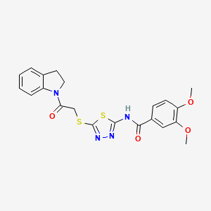 N-(5-((2-(indolin-1-yl)-2-oxoethyl)thio)-1,3,4-thiadiazol-2-yl)-3,4-dimethoxybenzamide