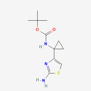 molecular formula C11H17N3O2S B2480680 Tert-butyl N-[1-(2-amino-1,3-thiazol-4-yl)cyclopropyl]carbamate CAS No. 2460756-72-1