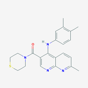 molecular formula C22H24N4OS B2480767 (4-((3,4-Dimethylphenyl)amino)-7-methyl-1,8-naphthyridin-3-yl)(thiomorpholino)methanone CAS No. 1251702-83-6