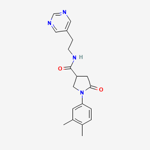 1-(3,4-dimethylphenyl)-5-oxo-N-(2-(pyrimidin-5-yl)ethyl)pyrrolidine-3-carboxamide