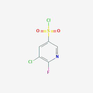 molecular formula C5H2Cl2FNO2S B2482134 5-Chloro-6-fluoropyridine-3-sulfonyl chloride CAS No. 1261585-97-0