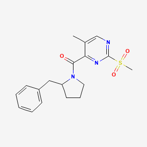 molecular formula C18H21N3O3S B2483169 (2-Benzylpyrrolidin-1-yl)-(5-methyl-2-methylsulfonylpyrimidin-4-yl)methanone CAS No. 2249200-68-6