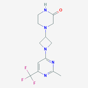 molecular formula C13H16F3N5O B2483223 4-[1-[2-Methyl-6-(trifluoromethyl)pyrimidin-4-yl]azetidin-3-yl]piperazin-2-one CAS No. 2415602-85-4