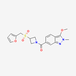 molecular formula C18H19N3O5S B2483818 (3-((furan-2-ylmethyl)sulfonyl)azetidin-1-yl)(3-methoxy-2-methyl-2H-indazol-6-yl)methanone CAS No. 1797698-34-0