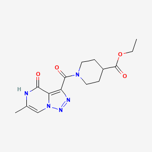 Ethyl 1-[(6-methyl-4-oxo-4,5-dihydro[1,2,3]triazolo[1,5-a]pyrazin-3-yl)carbonyl]piperidine-4-carboxylate