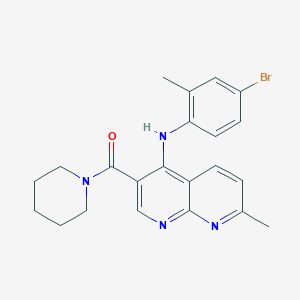 molecular formula C22H23BrN4O B2484527 (4-((4-溴-2-甲基苯基)氨基)-7-甲基-1,8-萘咪啶-3-基)(哌嗪-1-基)甲酮 CAS No. 1251693-43-2