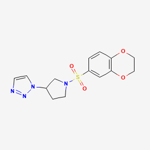 molecular formula C14H16N4O4S B2485397 1-(1-((2,3-dihydrobenzo[b][1,4]dioxin-6-yl)sulfonyl)pyrrolidin-3-yl)-1H-1,2,3-triazole CAS No. 1795212-12-2