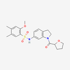 molecular formula C22H26N2O5S B2485400 2-甲氧基-4,5-二甲基-N-(1-(四氢呋喃-2-羰基)吲哚啉-6-基)苯磺酰胺 CAS No. 1040637-19-1