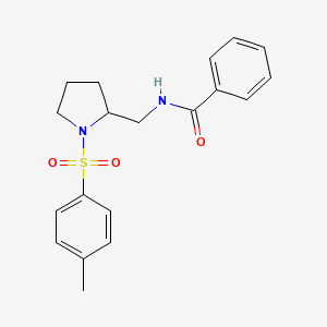 molecular formula C19H22N2O3S B2485876 N-((1-tosylpyrrolidin-2-yl)methyl)benzamide CAS No. 896277-38-6