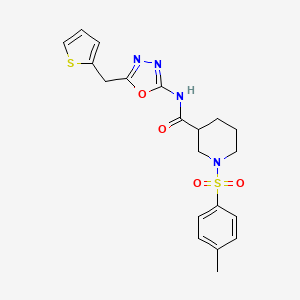 N-(5-(thiophen-2-ylmethyl)-1,3,4-oxadiazol-2-yl)-1-tosylpiperidine-3-carboxamide