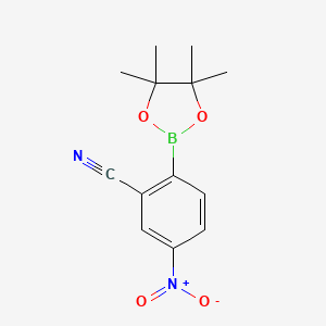 molecular formula C13H15BN2O4 B2487602 5-Nitro-2-(tetramethyl-1,3,2-dioxaborolan-2-yl)benzonitrile CAS No. 1565857-68-2